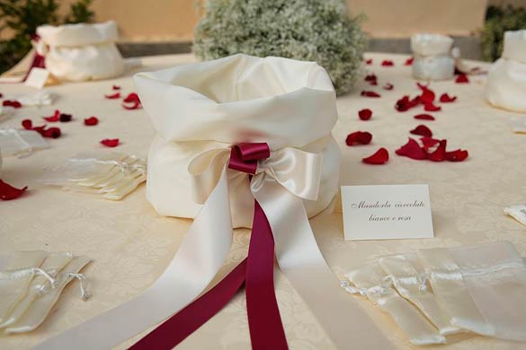 Centerpieces were just like floral cakes made with red roses and gypsophila